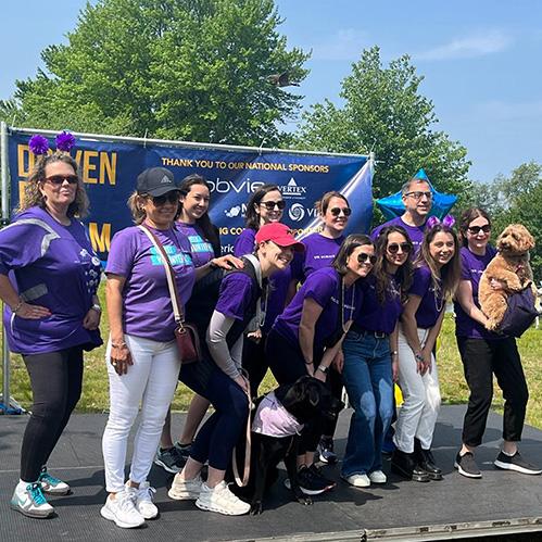 An image of a group of Vertexians in purple shirts attending the Great Strides walk