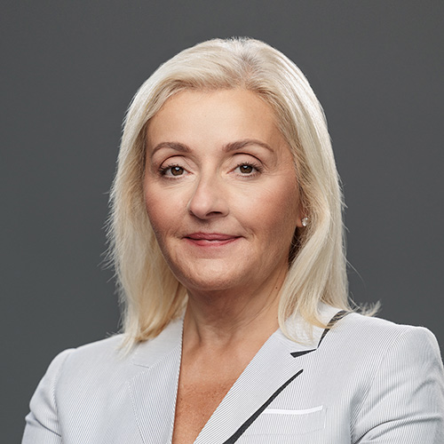 An image of Nia Tatsis, Executive Vice President and Chief Regulatory and Quality Officer at Vertex Pharmaceuticals