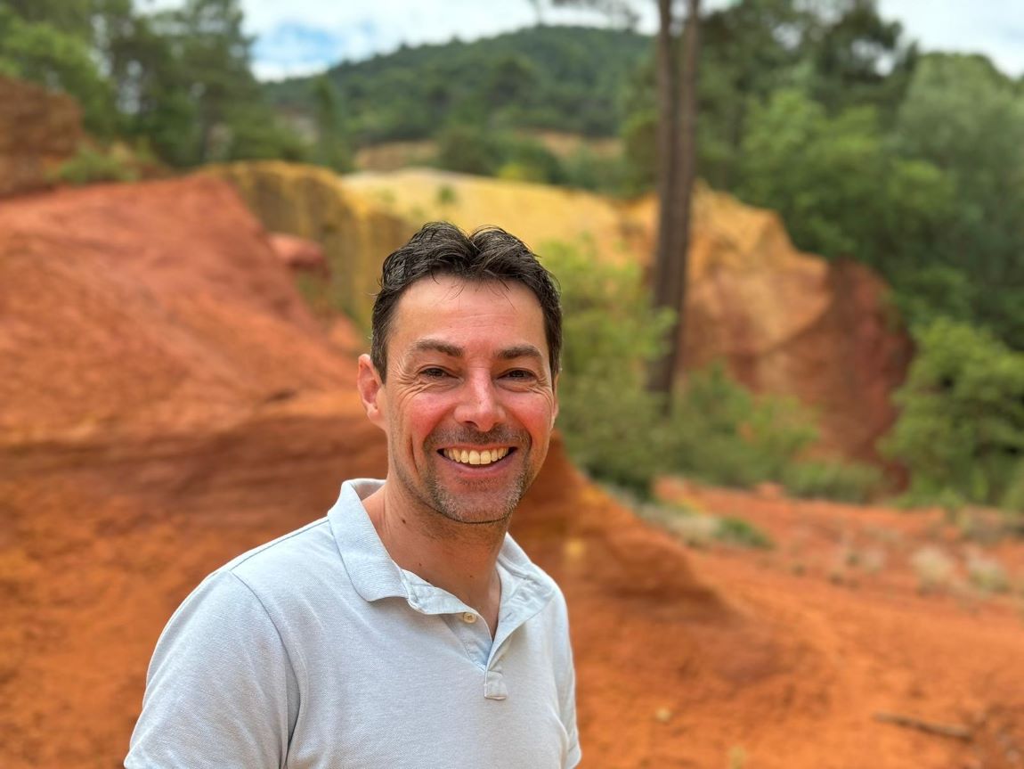 An image of Dr. Paul Brinkman, Assistant Professor at Amsterdam UMC and Project Coordinator for ONELAB, smiling at the camera while outside