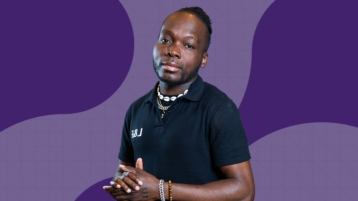 An image with a purple background of Tray Thom.