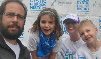 An image of Elizabeth Thompsen and her family at a CF walk