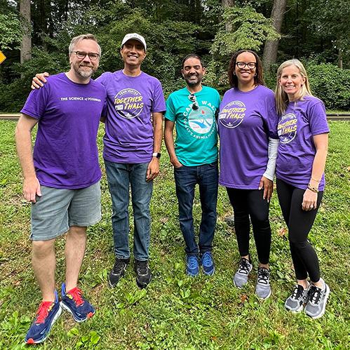 An image of five Vertexians smiling at the camera while attending the Cooley's Anemia Walk